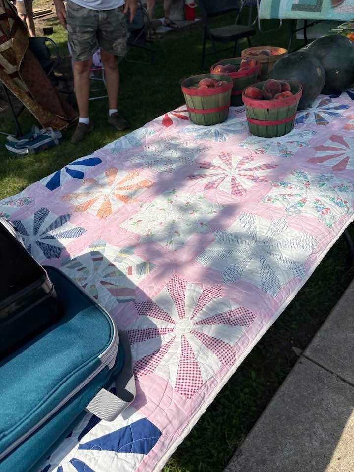 quilts being aired at the Hamilton Missouri farmers market